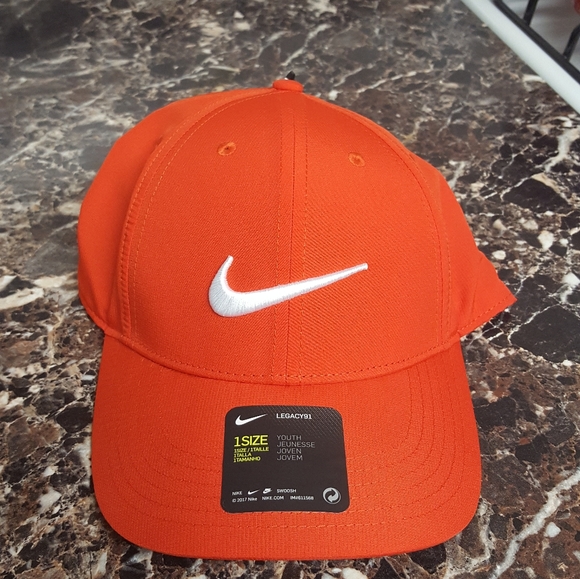 white and orange nike hat